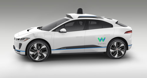 A White, Waymo-Brand Autonomous Car